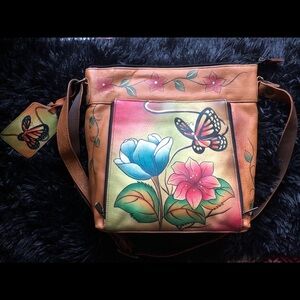 Anushka hand painted garden scene handbag.